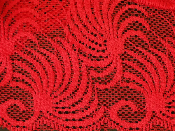 Красная кружевная ткань — стоковое фото
