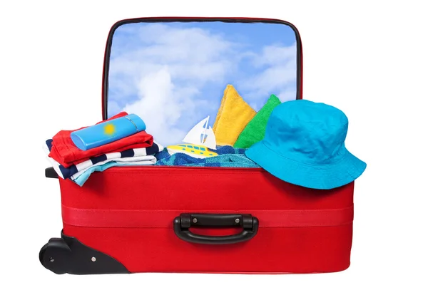 Путешествие красный чемодан упакован для отдыха — стоковое фото