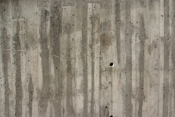 コンクリートの壁の穴 — ストック写真