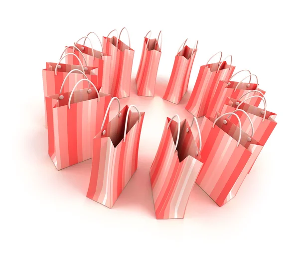 Circle of pink striped shopping bags — Stock Photo, Image