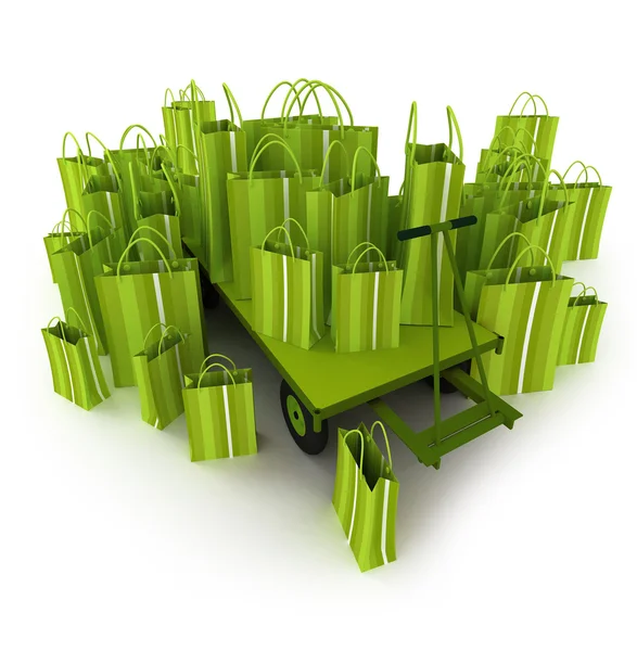 Зеленые сумки для покупок на тележке — стоковое фото