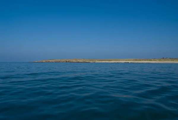 Insel in blau — Stockfoto