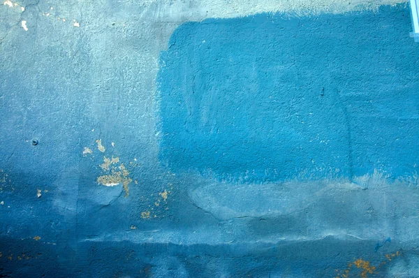 Gammel væg i forskellige nuancer af blå - Stock-foto