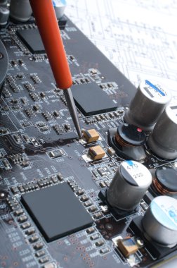 Repair a computer surface-mounted board clipart