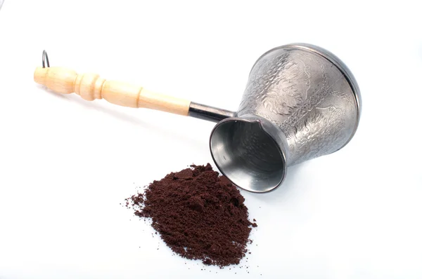 Coffee pot and ground coffee — Stock Photo, Image