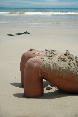 Feet in the sand at beach clipart