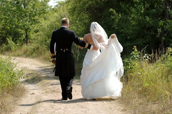 stock image Wedding couple walking