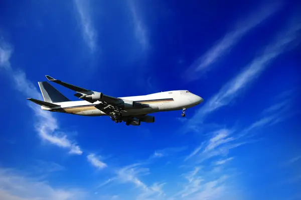 Plane and blue sky — Stock Photo, Image