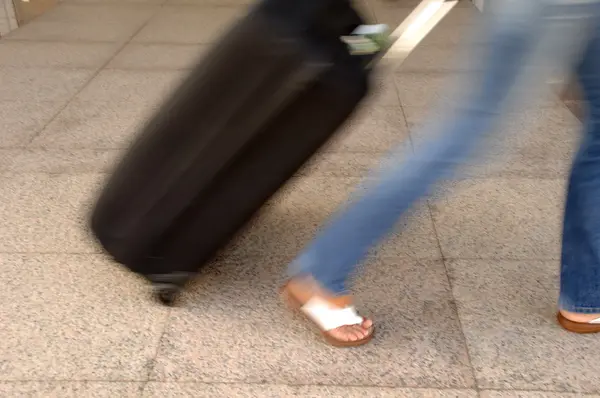 stock image Woman and suitcase