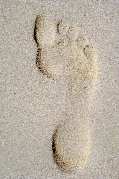 Fußabdruck im Sand am Strand — Stockfoto