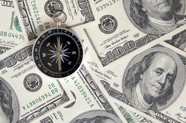 Kompass på kontanter — Stockfoto