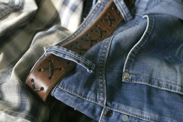 stock image Jeans, leather belt and a shirt