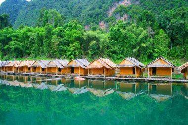 Houses on a raft Thailand clipart