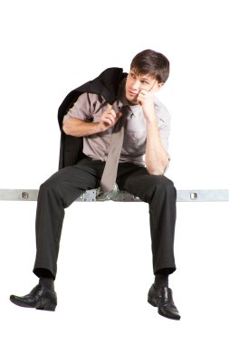 Businessman sitting on ladder clipart