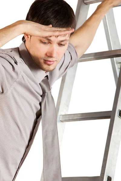 Businessman climbink n ladder — Stock Photo, Image