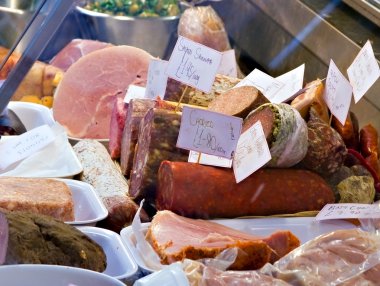 Cold cuts meats and sausages for sale clipart