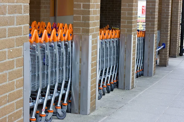 stock image A row of shopping trolleys