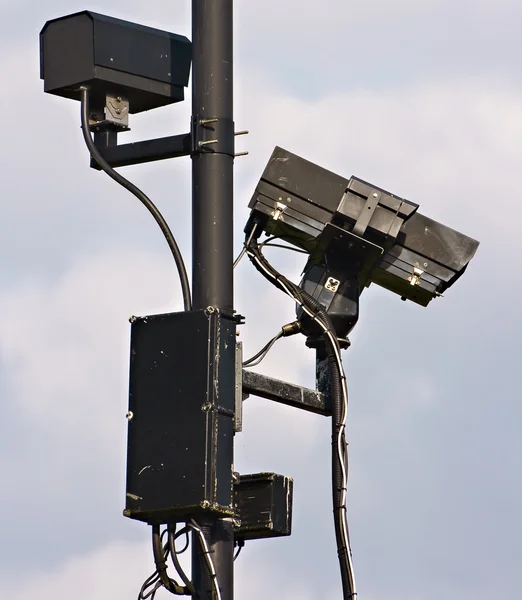 CCTV-kameror vakar över gemenskapen Stockfoto