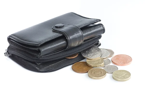 A black purse holding UK sterling coins — Stock Photo, Image