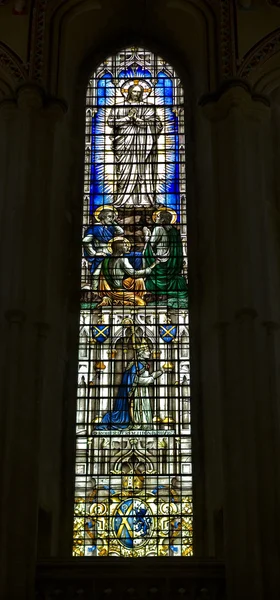 Stained glass window in Wells Cathedral Somerset UK