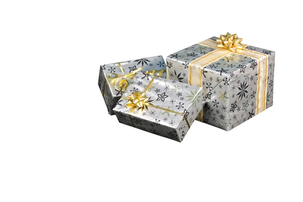 Wrapped Christmas gifts isolated on a white background — Stock Photo, Image