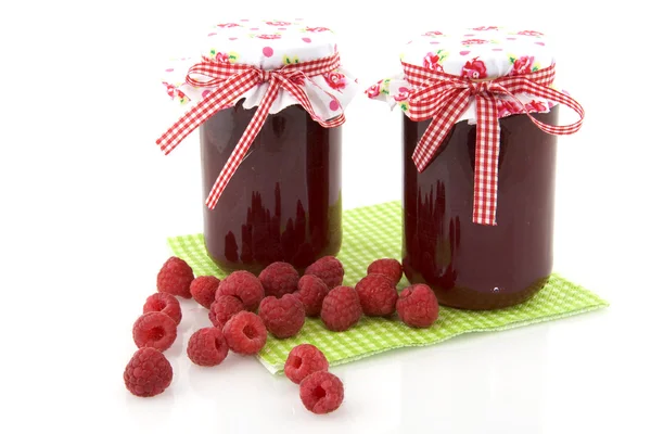 Glass pots with raspberry jam — Stock Photo, Image