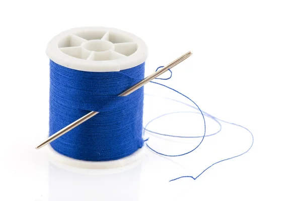 Bobbin with blue thread — Stock Photo, Image