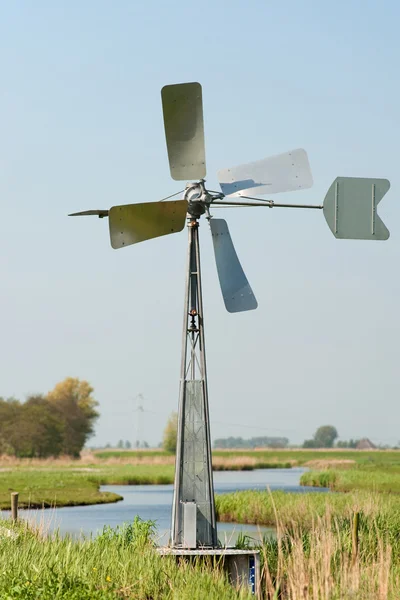 stock image Watermill in vertical Dutch landscape