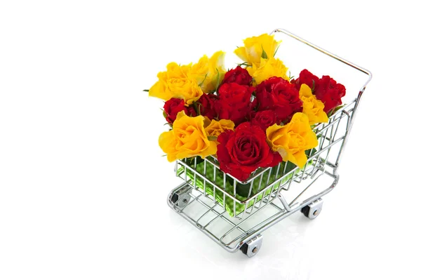 Shopping cart with roses — Stock Photo, Image