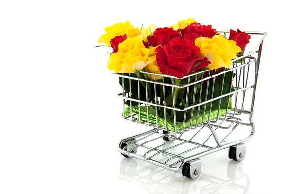 Stock image Shopping cart with roses