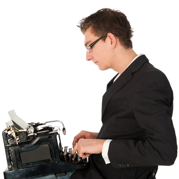 Tippen auf der schwarzen Schreibmaschine — Stockfoto
