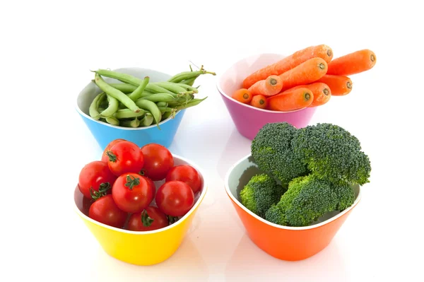 Colorful bowls with vegetables — Stock Photo, Image