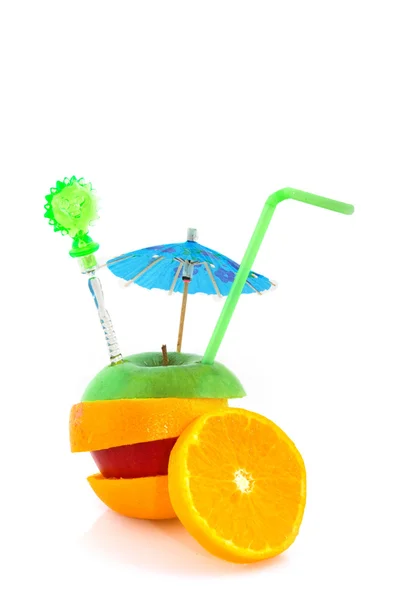 Tropical fruit with parasol — Stock Photo, Image