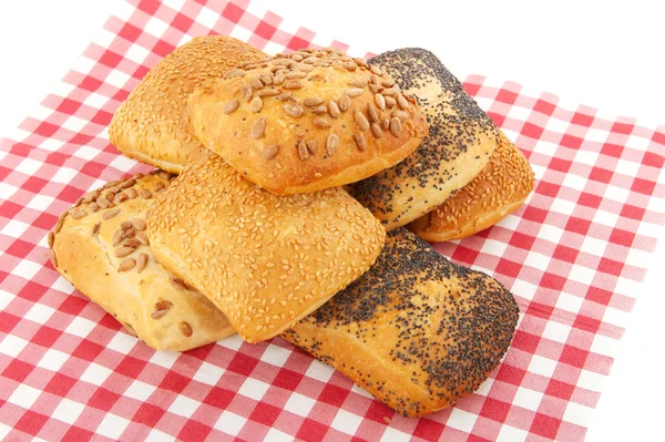 Rolos de pão de luxo no guardanapo verificado — Fotografia de Stock