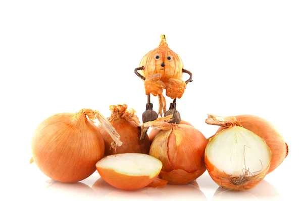 Onions with funny doll — Stock Photo, Image