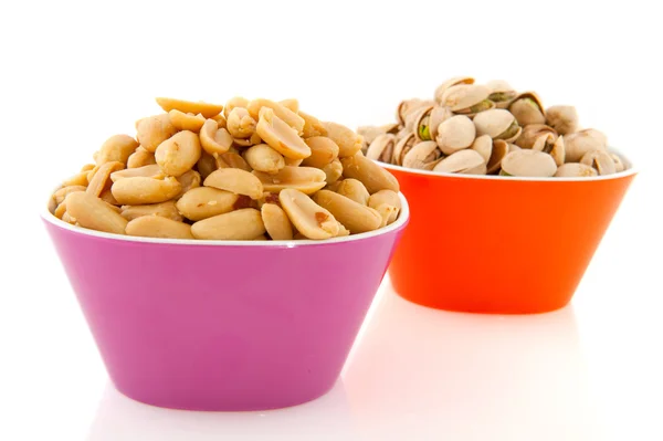Peanuts and pistachios — Stock Photo, Image