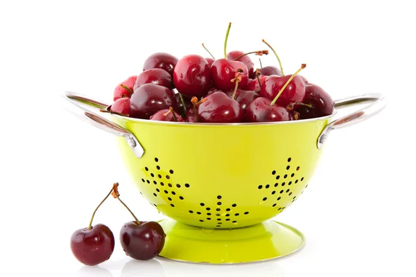 Colander with cherries — Stock Photo, Image