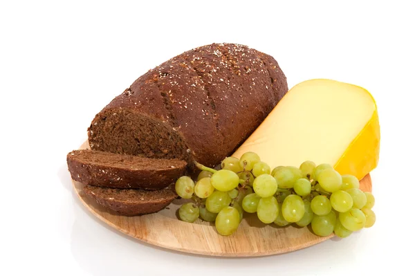 Whole meal bread grapes and cheese — Stock Photo, Image