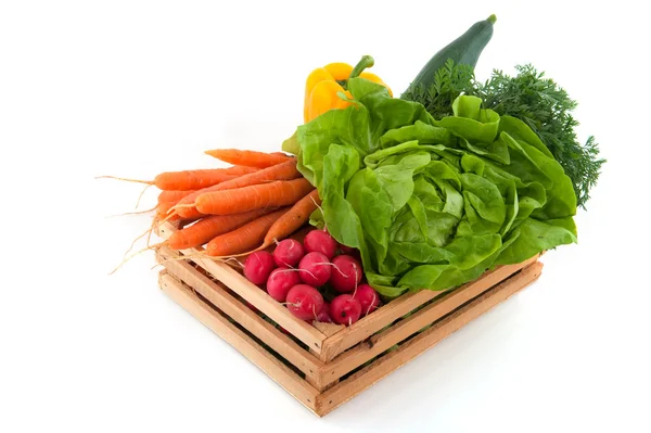 Houten kist met groenten — Stockfoto