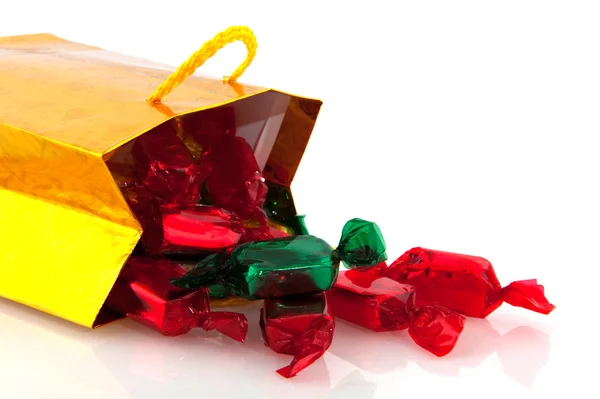 Golden bag with Christmas candy — Stock Photo, Image
