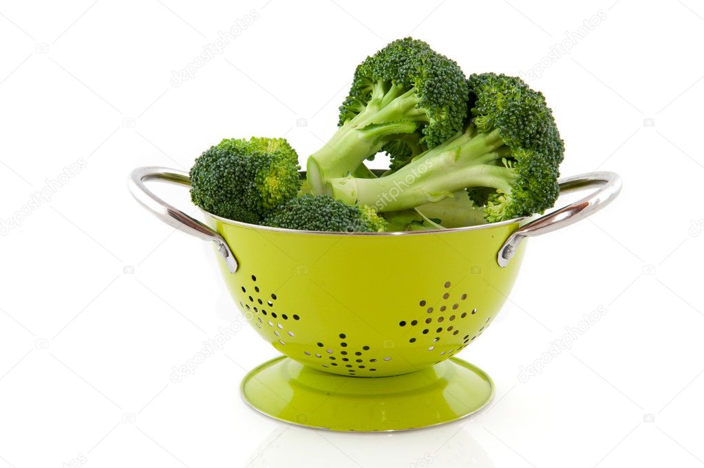 Green colander for washing broccoli