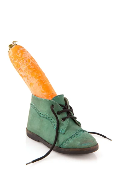 Schoenpoetsen met wortel — Stockfoto
