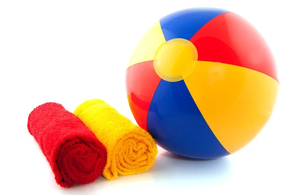 Beach ball with towels — Stock Photo, Image