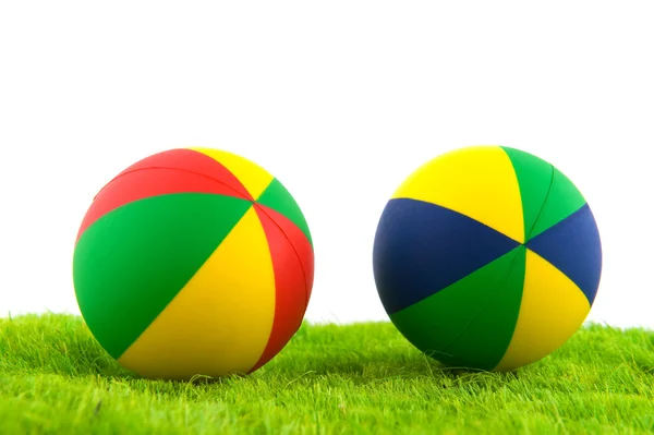 Toy balls in the grass — Stock Photo, Image