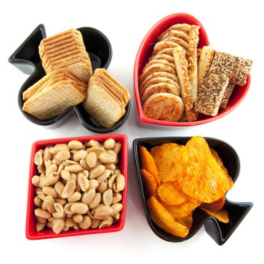 Playing cards symbols with salted snacks clipart