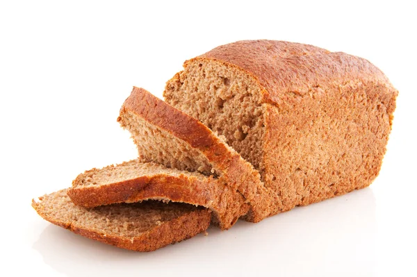 Celý tmavý chléb — Stock fotografie