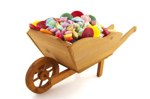 Kolo trakař plný s candy — Stock fotografie