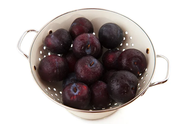 Colander fresh plums — Stock Photo, Image