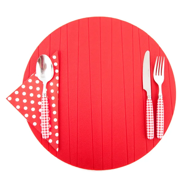 Tischmatte mit rotem Besteck — Stockfoto