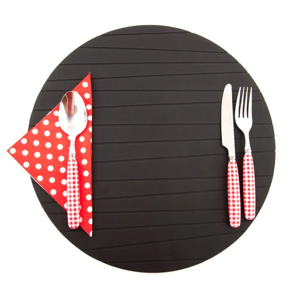 Place mat with red cutlery — Stock Photo, Image